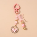 Dettaglio portachiavi a farfalla rosa con perline acriliche e anello con strass - Rosa