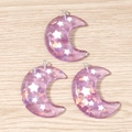 Detailed view of purple resin crescent moon charms with stars for DIY jewelry - 10 Pieces Pack / Purple