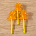 Detailed view of orange resin dinosaur lollipop pendants with sparkling glitter flakes - 10 Pieces Pack / Yellow