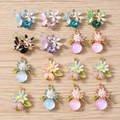 Pendentifs assortis fleurs et papillons émaillés avec strass pour création bijoux - Style Mixte Fleur / Lot de 10 / Rose vif