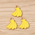 Close-up of three yellow enamel banana charms with gold metal edges for DIY jewelry making - Simulation Banana (3143) / 5 Pieces / Banana