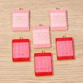 Puzzle-shaped I LOVE YOU enamel charms in pink and red with gold rings for DIY jewelry - Multicolor