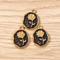 Macro shot of three vintage oval rose pendants with black enamel and gold LOVE relief - 10 Pieces Pack / Black