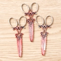 Macro detail of three retro silver scissors pendants with realistic red blood stains - 10 Pieces Pack / Scissors Design
