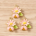 Détail de pendentifs fleurs et coccinelles en émail pour la fabrication de bijoux DIY - Fleur & Scarabée / Lot de 10 / Rose