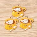 Detailed view of coffee cup pendants for jewelry making with latte art and golden edges - 10 Pieces Pack / Yellow
