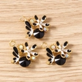 Détails de pendentifs floraux avec émail noir, strass et pierres précieuses facettées - Papillon de Fleur / Lot de 10 / Noir Doré