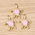 Three gold-plated turtle charms with pink opal stones for DIY jewelry making - 10 Pieces Pack / Gold Pink