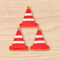Macro view of three red and white enamel traffic cone charms for DIY jewelry making - Red And White Fire Cone