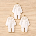 Detail view of doctor coat enamel charms with stethoscope patterns and golden metal edges - 10 Pieces Pack / White