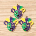 Detailed close-up of three colorful clown mask charms for DIY jewelry making on wood texture - Tragedy Mask / 10 Pieces Pack / Yellow & Purple
