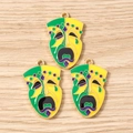Macro view of colorful carnival mask charms with green yellow enamel and gold loop - Crying Mask / 10 Pieces Pack / Yellow-Green