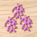 Detailweergave van paarse koralen bedeltjes met gouden plating voor DIY sieraden maken - 10 Stuks Verpakking / Paars