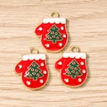 Close-up of red enamel Christmas glove pendants with green tree design for DIY jewelry - 10 Pieces Pack / Gold Red Christmas Tree Glove