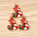 Macro shot of gold-plated Christmas candy cane charms with red bows for DIY jewelry - 10 Pieces Pack / Double Christmas Canes