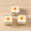 Macro view of silver square metal beads with floral pattern for DIY jewelry making - 5 Pieces / Yellow Flower Square Bead