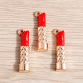 Lipstick shaped jewelry pendants with red enamel and gold textured metal base - Red