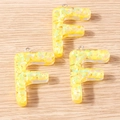 Three yellow resin letter F pendants with translucent flower sequins and metal ring - 5 Pieces / Letter F