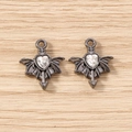 Detail showing Gothic bat wing heart charms in gunmetal finish with sparkling rhinestones - 5 Pieces / Off-White