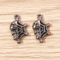 Macro shot of gothic spider web and skull charms with pink rhinestones for DIY jewelry - 5 Pieces / Dusty Pink