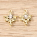 Detailed view of gold-plated winged heart charms with crystal inlay for DIY jewelry - 5 Pieces / Gold White