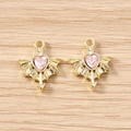 Detail of gothic wing heart charms with pink gemstone and gold finish for DIY crafts - 5 Pieces / Gold Pink