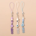 Three-piece beaded Evil Eye phone straps with BOO charms in purple, white, and blue colors - Purple White Blue