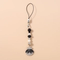 Détails d'une dragonne de téléphone en perles avec pendentif coquillage noir - Coquillage Noir