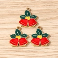 Détail de trois breloques cloches de Noël en émail pour la fabrication de bijoux DIY - Lot de 10 / Cloche de Noël