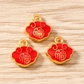 Macro detail of three gold-plated Ruyi lock pendants with red enamel and Fu character - Fu Character Style / 10 Pieces Pack