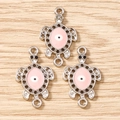 Dettaglio di ciondoli a tartaruga in argento con smalto rosa e malocchio per gioielli DIY - Rosa Argento