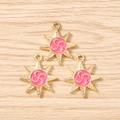Macro detail of eight-pointed star charms in gold and pink enamel for DIY jewelry - 10 Pieces Pack / Gold Rose Red