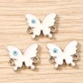 Three white enamel butterfly charms with blue dots and silver double rings on wood - 10 Pieces Pack / Silver