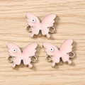 Pink enamel butterfly jewelry connectors with evil eye patterns for DIY crafting - 10 Pieces Pack / Silver Pink