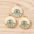 Detail of three gold alloy evil eye charms with green white and blue enamel for jewelry DIY - 10 Pieces Pack / Gold Green