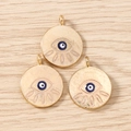 Macro view of three gold evil eye pendants with blue enamel detail on wood background - 10 Pieces Pack / Gold Pink