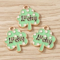 Detail of green four-leaf clover lucky charms with gold edges for jewelry making - 10 Pieces Pack / Lucky Shamrock
