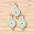 Drei blaue Emaille Evil Eye Anhänger mit Goldrand auf einem Holz Hintergrund - 10 Stück / Goldblau