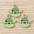 Detailed close-up of green St. Patrick's Day hat pendants with clover charms on wood - 10 Pieces Pack / Hat
