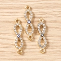 Detail von goldenen Unendlichkeit-Anhängern mit Evil-Eye-Perle und Strass-Verzierung - 10 Stück/Packung / Gold Blau