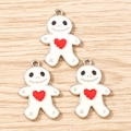 Detail of white skeleton gingerbread man charms with red hearts for jewelry making - 10 Pieces Pack / White