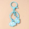 Detalle de llavero de nube azul claro y colgante de galleta con hebilla en D y aro - Azul