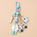 Detailed view of blue nurse uniform and ambulance charms on a beaded keychain accessory - Blue