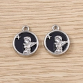 Close-up of silver angel and star charms with black enamel finish for DIY jewelry - Silver Black Angel