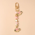 Detailansicht der goldenen Perlenkette mit rosa Wolken und Hi-Gravur - Gold und Rosa Wolke