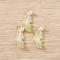 Golden feather pendants with faux pearls for DIY jewelry making on wooden background - 5 Pieces / Gold