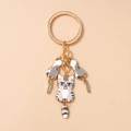 Détail de porte-clés chat mignon doré avec chat à rayures grises et finition émail - Blanc Grisâtre