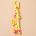 Detail of a butterfly charm with yellow braided rope and matching metallic carabiner - Yellow