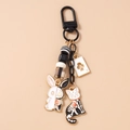 Detail of cartoon rabbit and cat keychain with poker card pendant and acrylic beads - White Theme Cat Rabbit