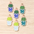 DIY cactus alloy charms with colorful polka dot pots and smiley faces on wood background - Multicolor